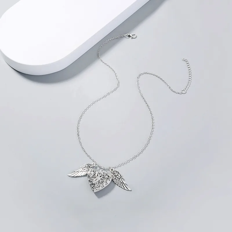 Elegant Angel Wings Luminous Heart Necklace