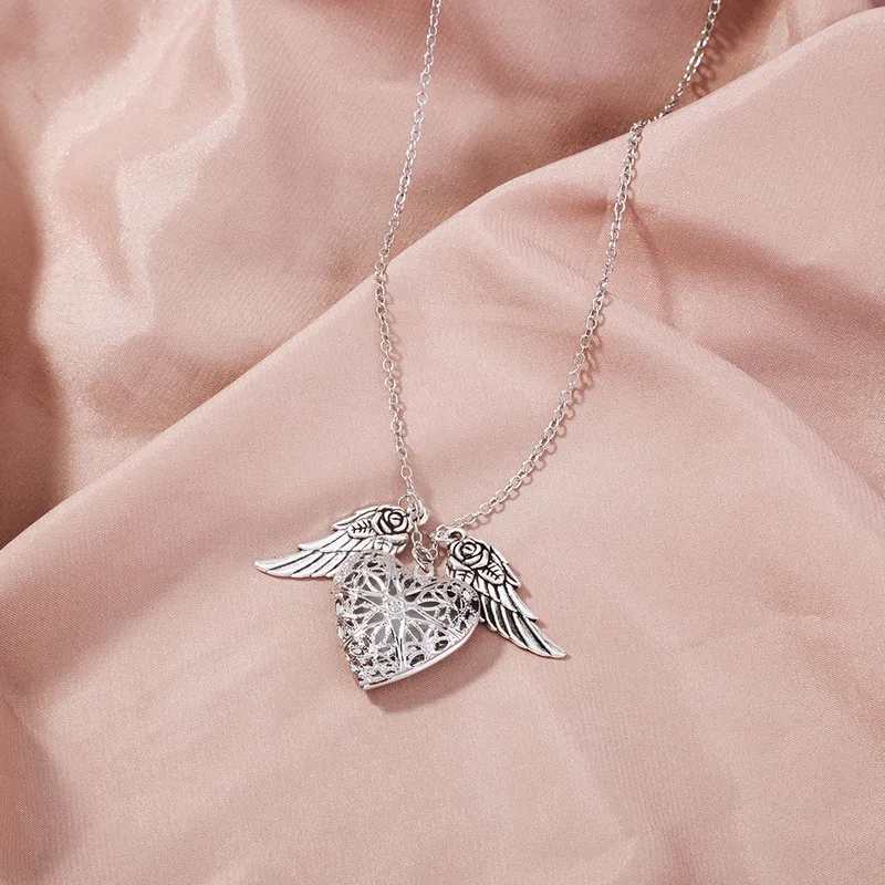Elegant Angel Wings Luminous Heart Necklace
